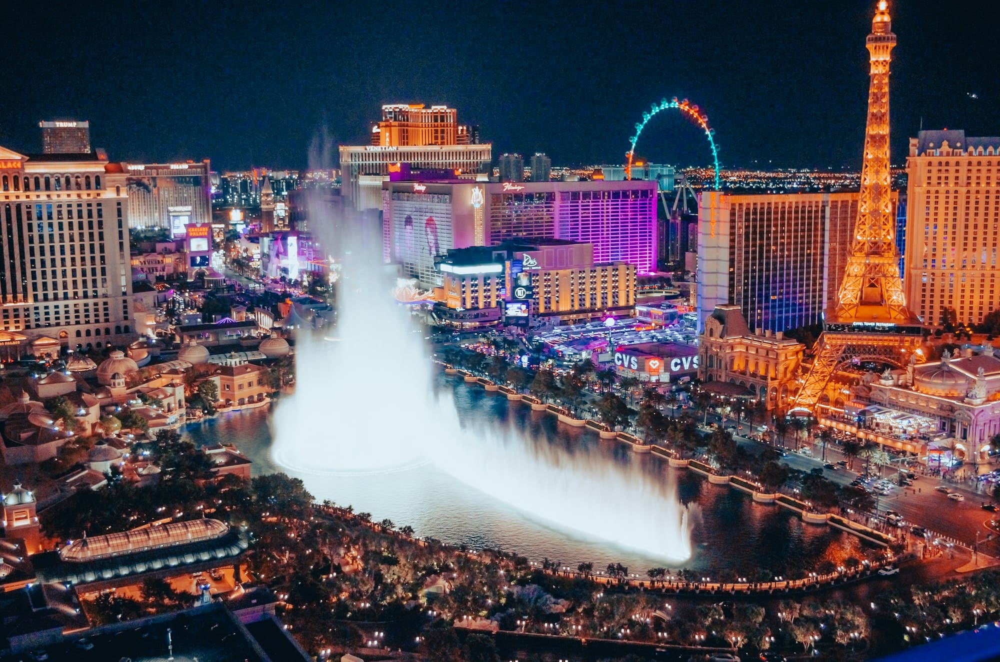 The Bellagio fountains and the Las Vegas Strip lit up at night