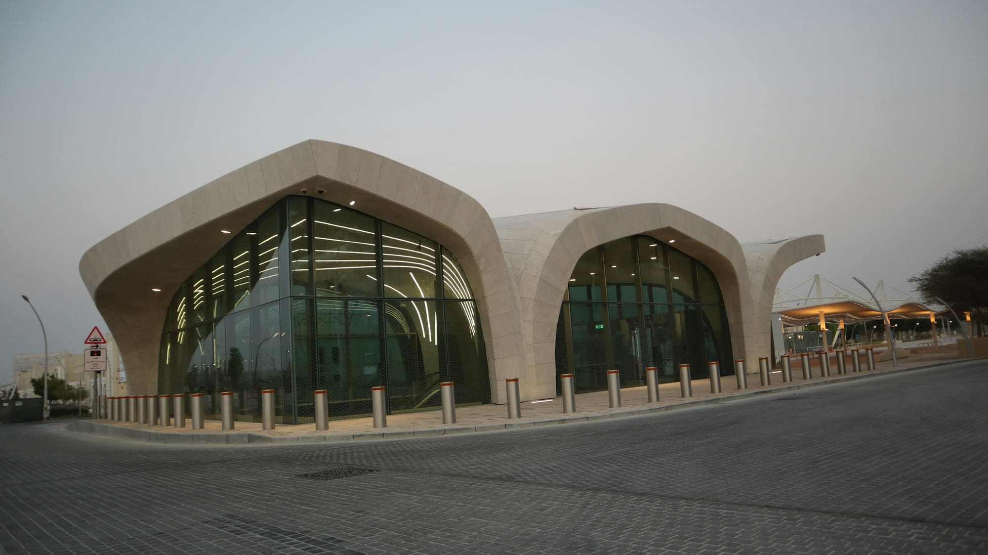 A Doha Metro station with a curved roof