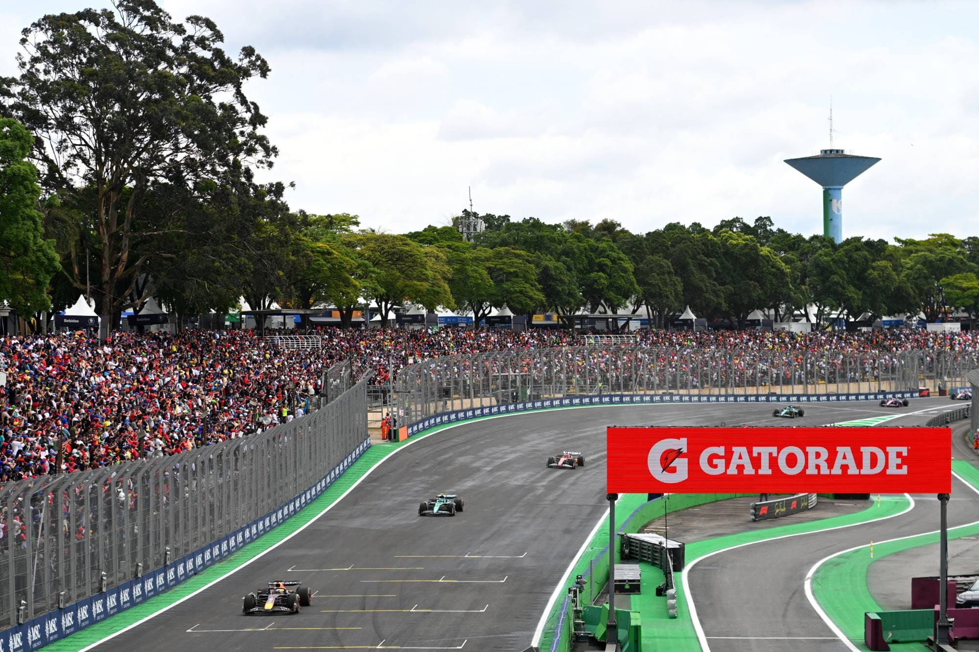 Max Verstappen leads Fernando Alonso and Charles Leclerc in the 2025 São Paulo Sprint at Interlagos